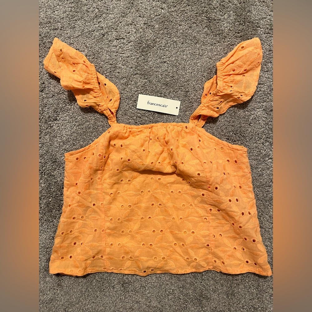 NWT Eyelet Flutter Sleeve Top from Francesca’s
